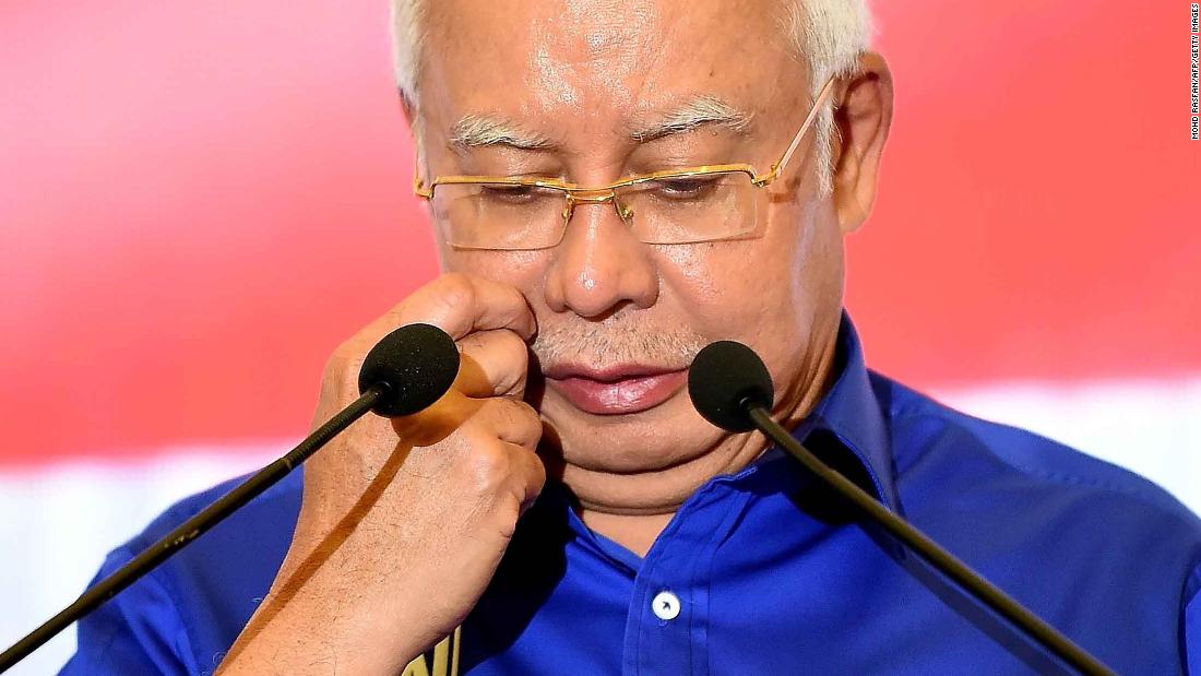 Malaysia’s scandal-mired Najib hit with travel ban after poll loss